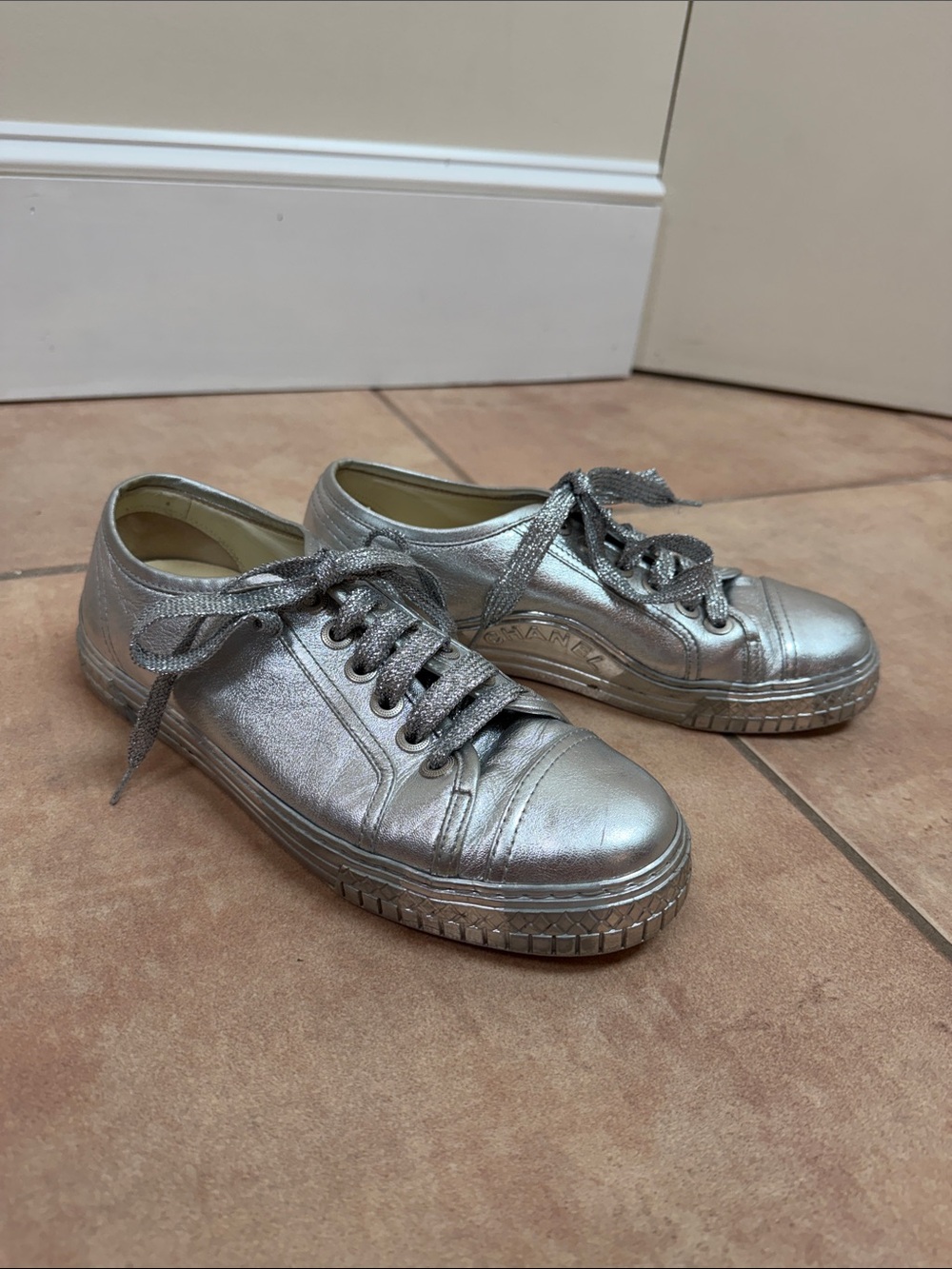 CHANEL Metallic Silver Low-Top Sneakers